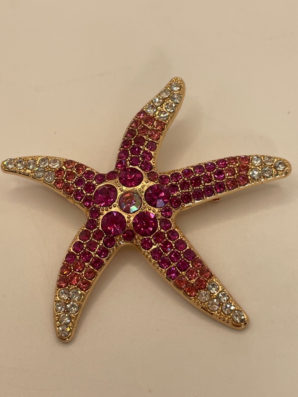 Gold Tone Starfish Brooch with Pink and Clear Rhinestones 2”